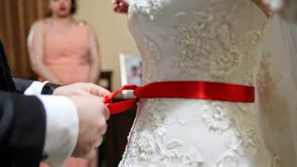 Qual è il significato del nastro rosso? Perché la cintura rossa è legata alla sposa?