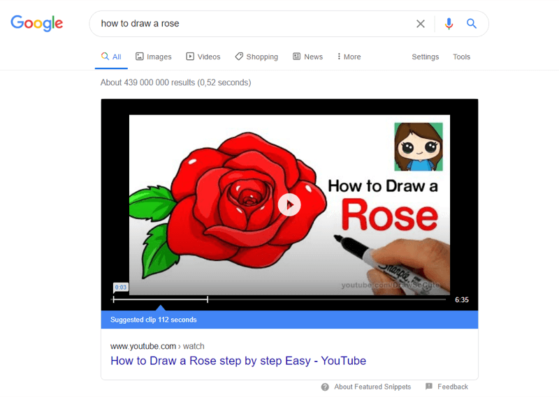 esempio del primo video di YouTube nei risultati di ricerca di Google per "come disegnare una rosa"