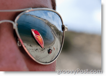 Fotografia - Esempio di apertura - Occhiali da sole con riflesso Skiboat rosso